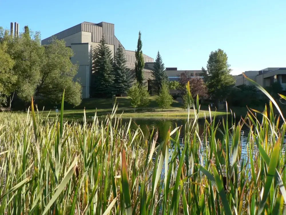 The older part of the Mount Royal University campus seen across the pond