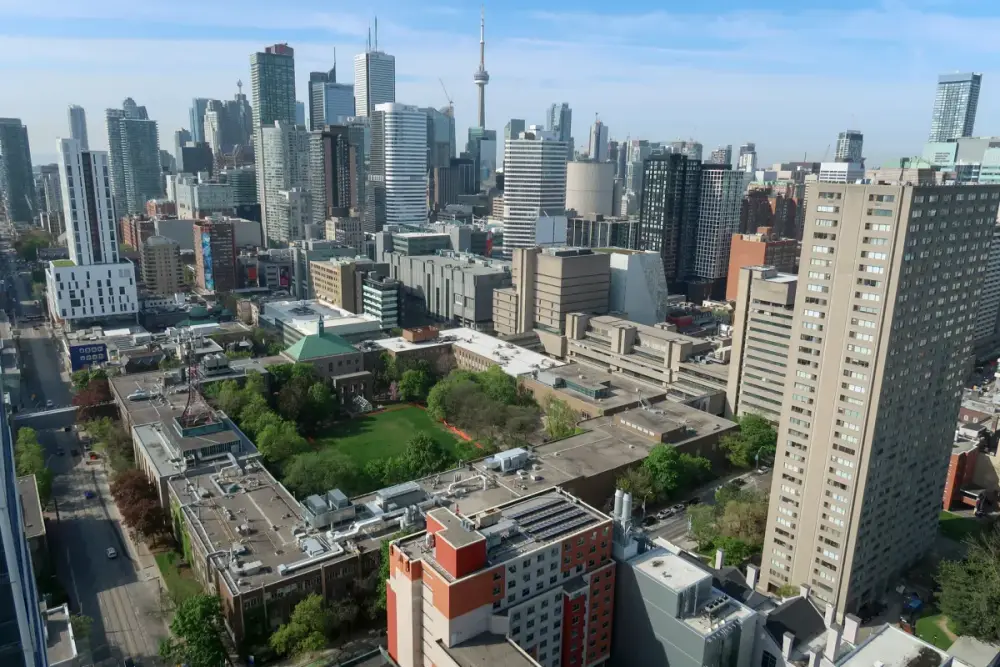 Aerial view of Toronto Metropolitan University campus with the CN Tower in the background
